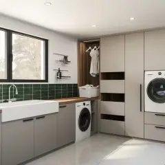Aménagement buanderie moderne avec évier, lave-linge, rangements intégrés et une penderie ouverte.