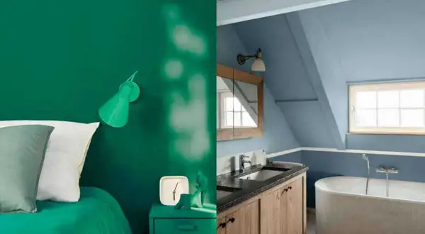 Chambre verte avec un lit et une lampe, et salle de bain bleue avec baignoire et lavabo. Les murs sont recouverts d'une peinture mat ou satin.